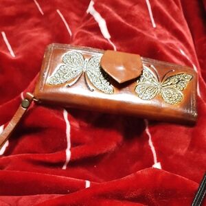 Elegant Brown Leather Clutch with Butterfly Design